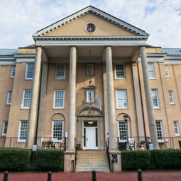 Stately three story columns highlight the front entrance of Preston Residential College