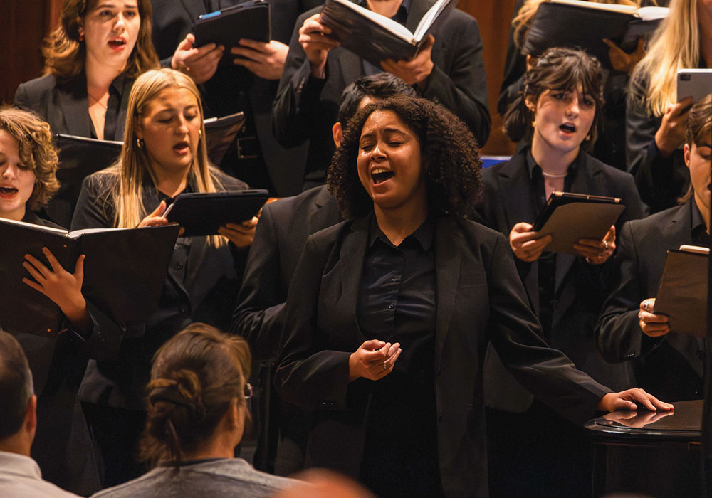 student singing in ensemble 