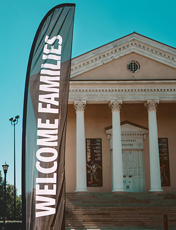 a banner reads Welcome Families in front of Longstreet Theater