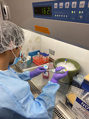 photo of a man working in a lab