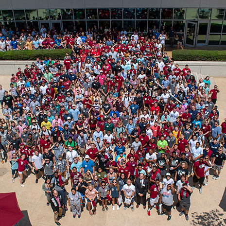 The CEC's freshman class gathers in the courtyard.