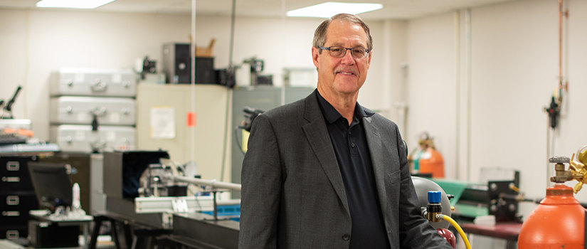 Michael Sutton stands in his laboratory.