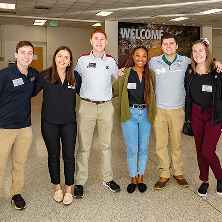 Six members of the Leadership Program pose for a photo.