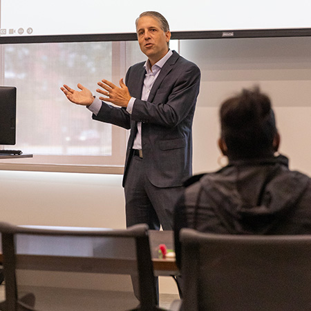 Derek Black lecturing to students in classroom