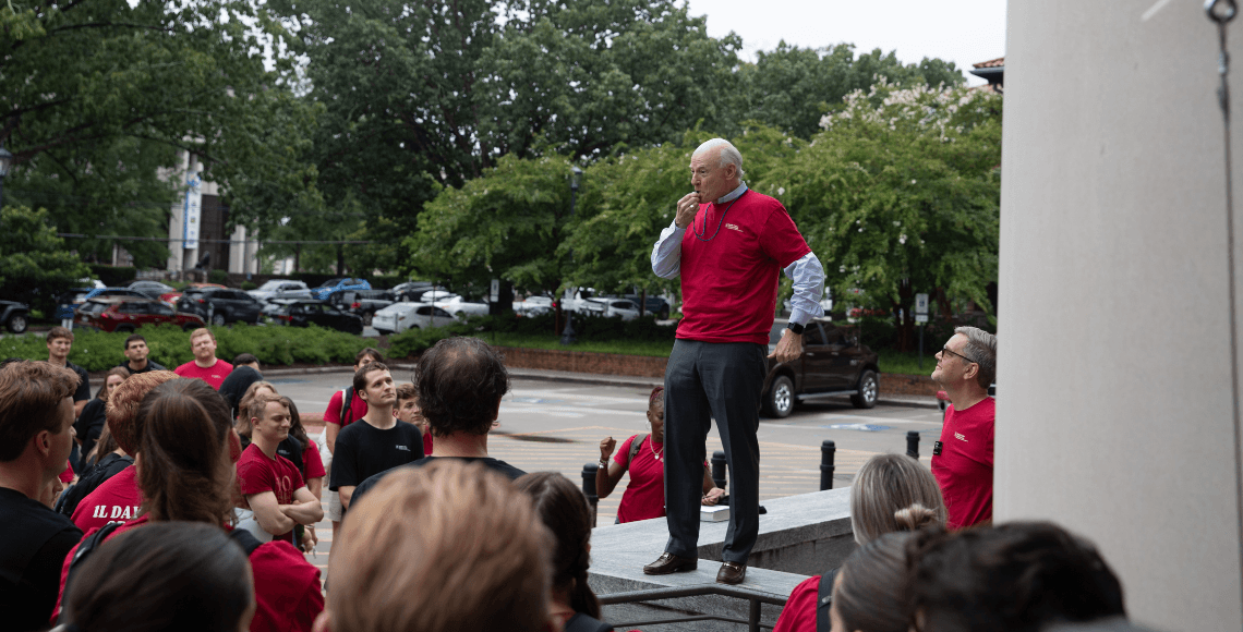Dean Hubbard blowing the whistle to start 1L Service Day