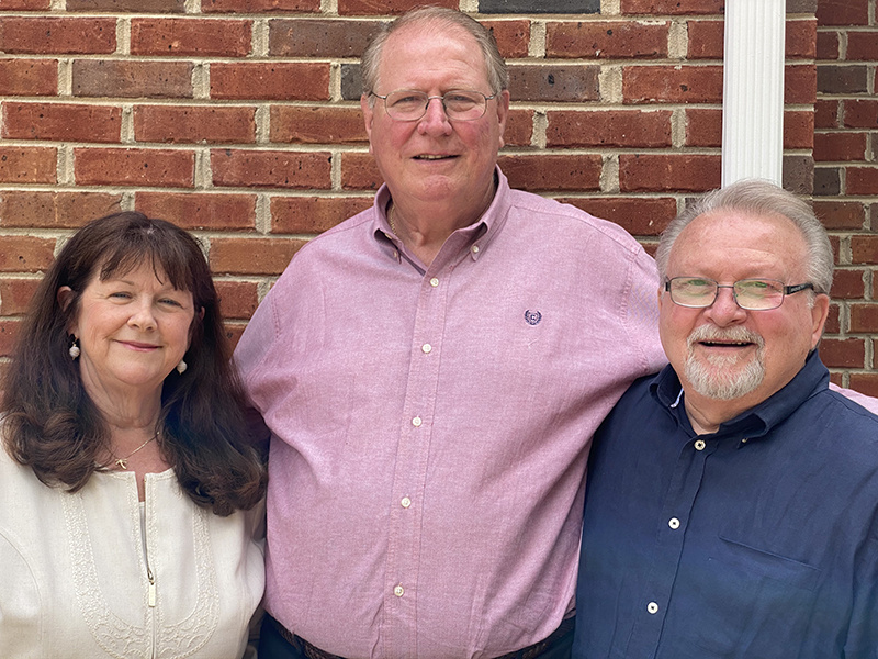 Dr. Karen McDonnell, Charles Morris, and Howard Helmly 