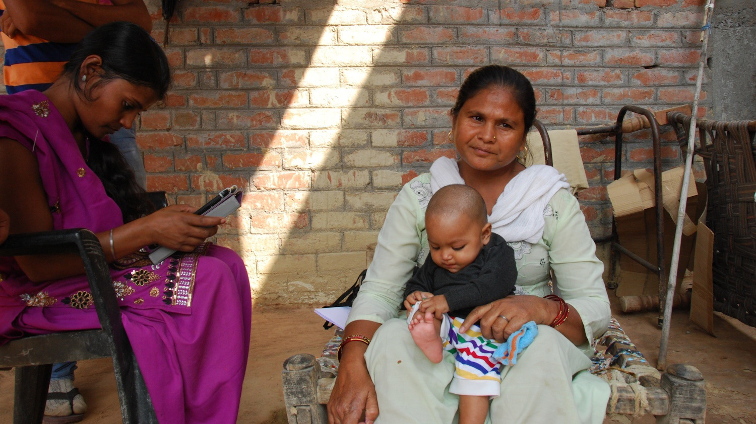 baby on mother's lap