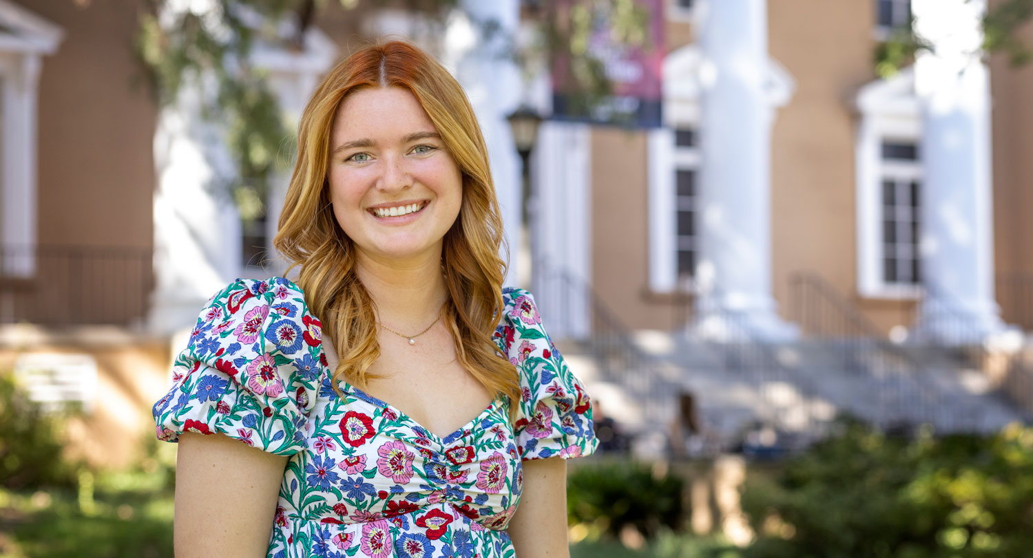 Woman standing in an outdoor area