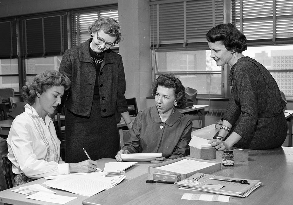 Ada B. Thomas with two other women at a table.