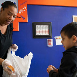 teacher and student in classroom