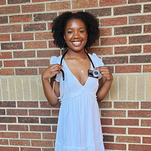 Hasanna Davis gets her nursing stethoscope